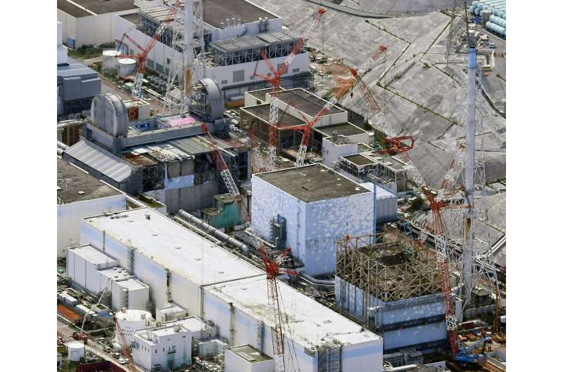 Japan revises Fukushima cleanup plan, delays key steps