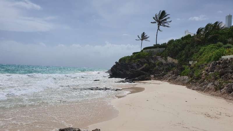 Residents of Bermuda prepared for the arrival of Hurricane Humberto—seen here is Grape Bay Beach in Paget, not far from the capi