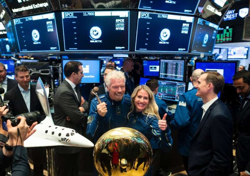 Richard Branson, founder of Virgin Galactic, poses before ringing the First Trade Bell to commemorate the company's first day of