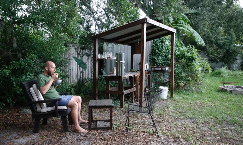 Rob Greenfield lives in someone else's backyard, and has set up an open-air kitchen of sorts