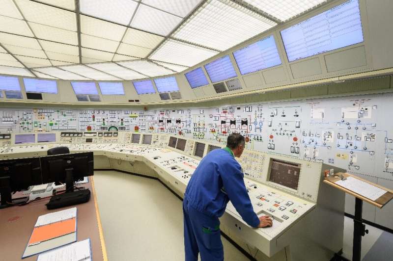 The command centre's large control panels and colourful buttons are reminiscent of the 1960s