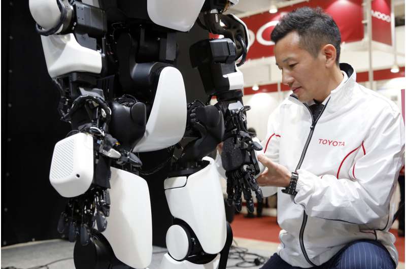 Toyota's humanoid duplicates movements in robotic mobility