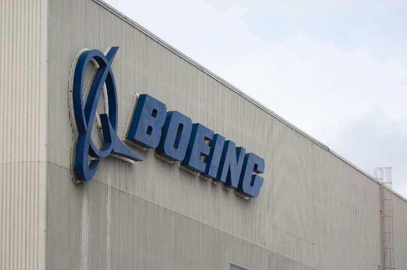 Boeing reported a drop in first-quarter profits due to increased costs associated with the 737 MAX grounding