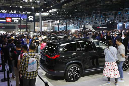China's auto show highlights electric ambitions