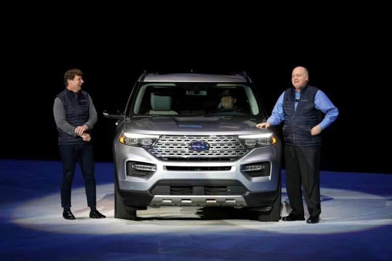 Ford CEO Jim Hackett (R), Jim Farley, president of global markets, unveiled the 2020 Ford Explorer SUV, part of its restructurin
