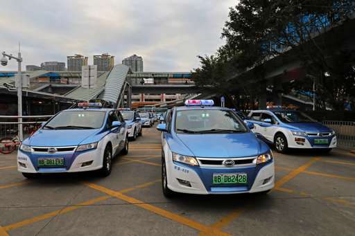 Giving up gas: China's Shenzhen switches to electric taxis