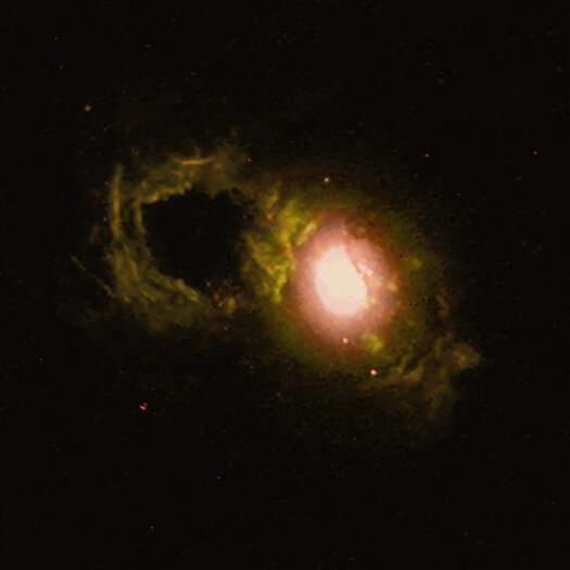 SDSS J1430+1339: Storm rages in cosmic teacup