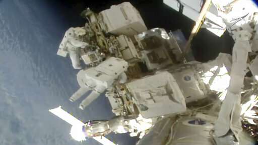 Spacewalking astronauts replace more station batteries (Update)