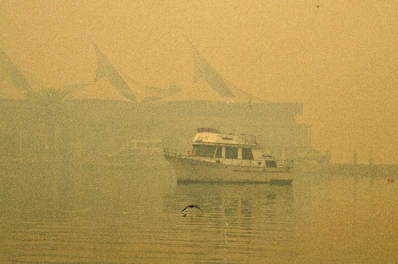 The toxic haze has made conditions on the water hazardous, with a harbour yacht race cancelled because of poor visibility