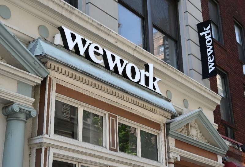 WeWork announced Monday that it will withdraw a plan to go public but will revive an initial public offering down the road