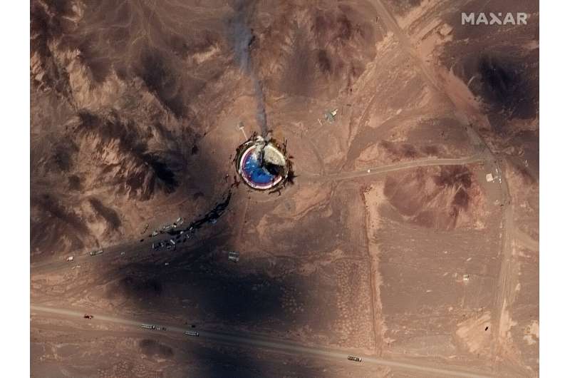 Satellite photos show burning Iran space center launch pad