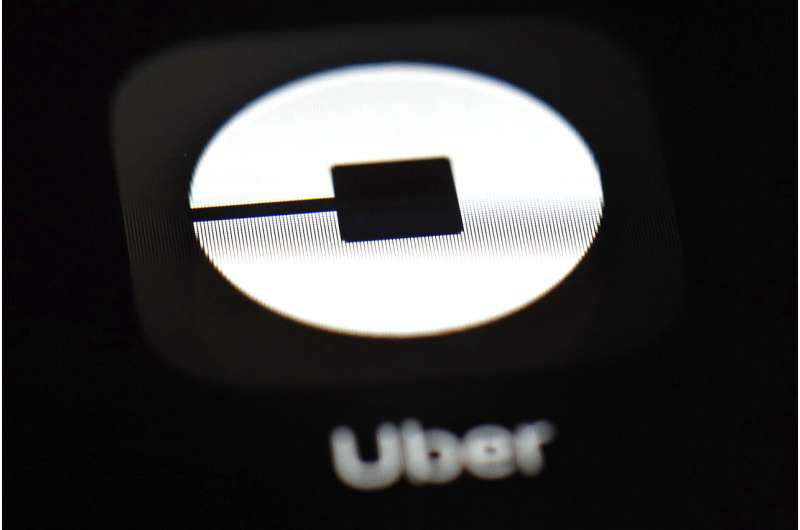 Uber begins trading nearly 7% below its IPO price