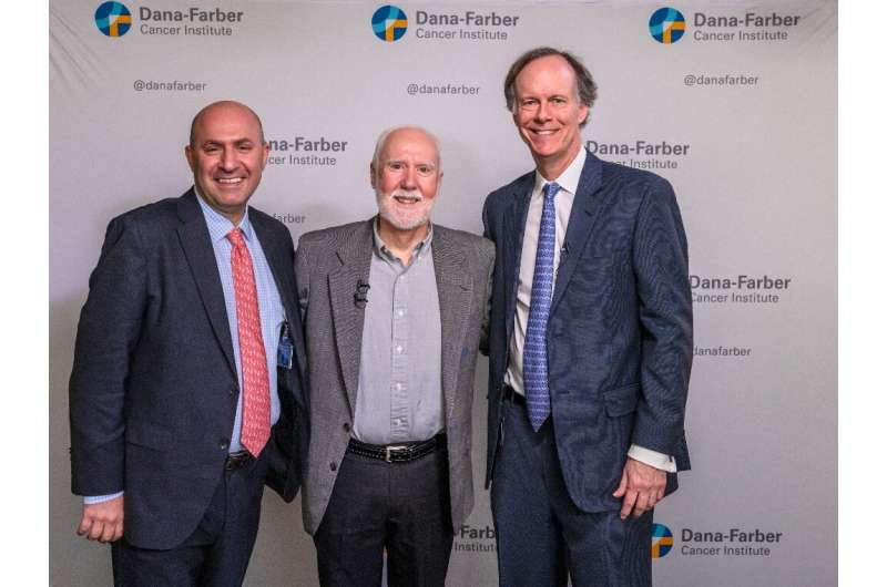 Cancer patient Shaun Tierney (C) is seen here with his doctor Toni Choueiri (L) and Nobel prize winner William Kaelin (R) at the