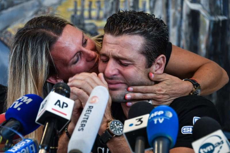 Franky Zapata got a peck of encouragement from his wife Krystel after he broke down in tears of emotion at a press conference in
