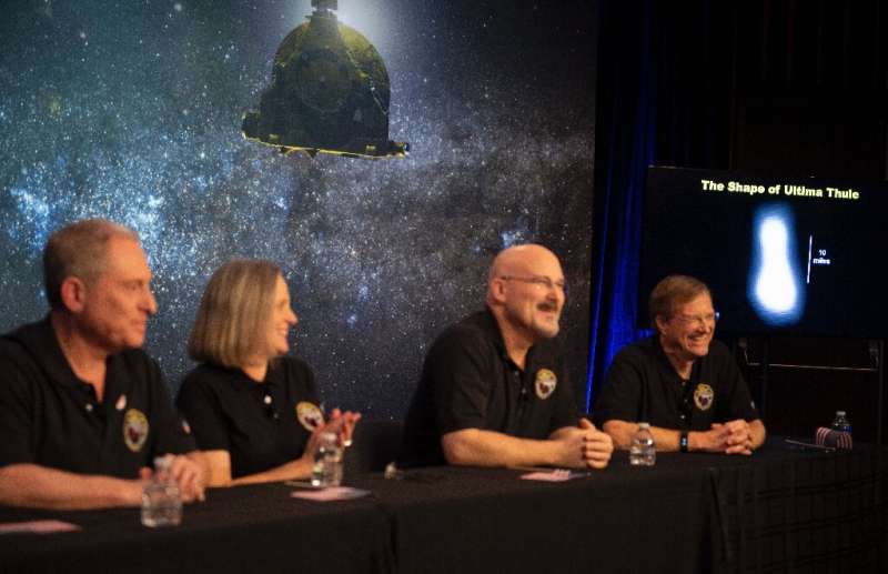 This handout photo released by NASA shows a new image of Arrokoth on a screen during a press conference after the team received 