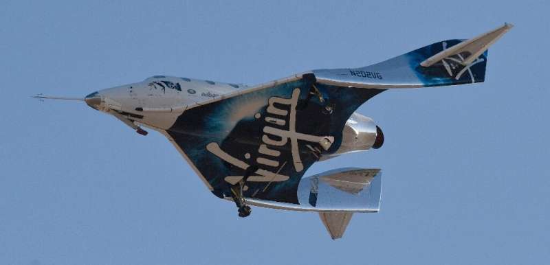 Virgin Galactic's SpaceshipTwo-class VSS Unity comes in for a landing after its suborbital test flight on December 13, 2018, in 