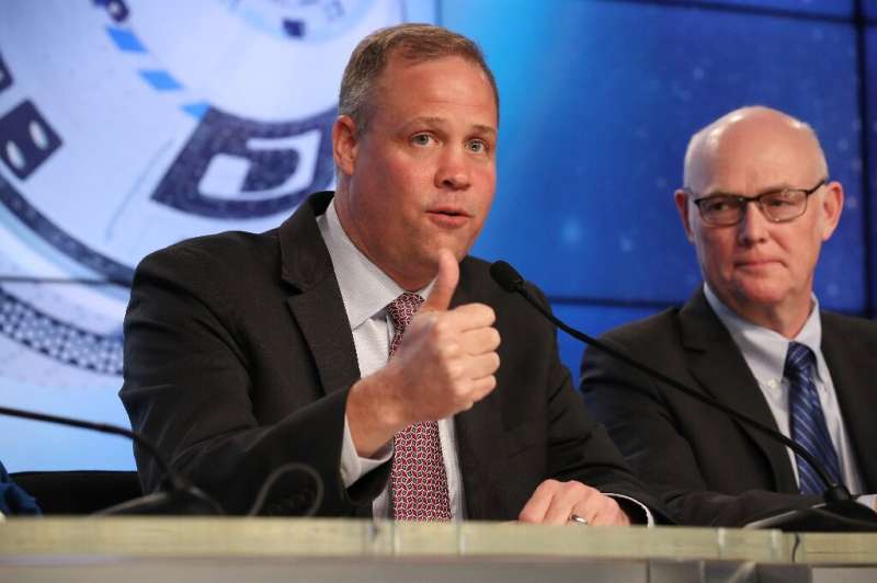 NASA Administrator Jim Bridenstine (L) says Boeing's Starliner capsule accomplished at least some of its objectives