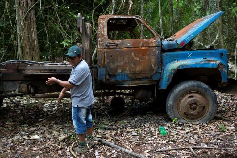 A burnt-out truck found on Arara land was once used to carry illegally acquired timber; then dozens of indigenous people set it 