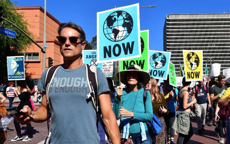 Activists march through downtown Los Angeles in November 2019 in a climate change rally addressed by teenage Swedish activist Gr