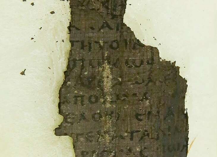A fragment of the  Herculaneum scroll dating back nearly 2,000 years which  researchers hope to be able to decipher with the hel