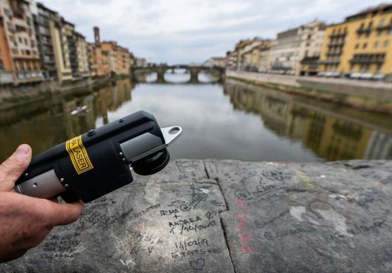 A latest-generation infrared wand is being used to remove graffiti spoiling the city of Florence