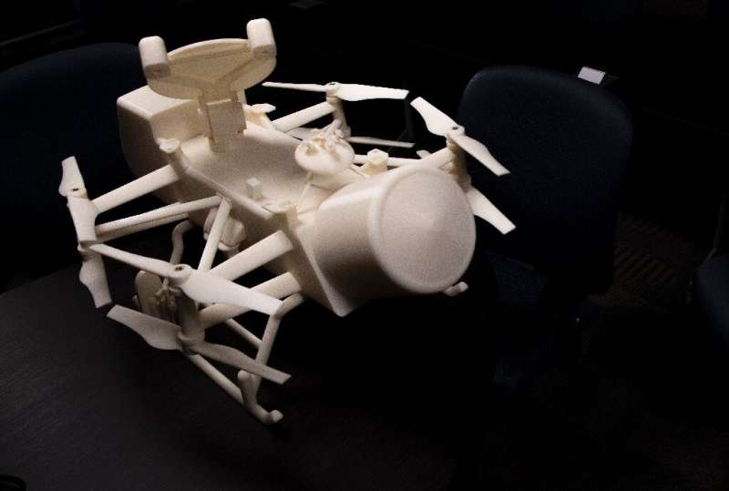 A model of the Dragonfly drone copter, which will land on Titan in 2034