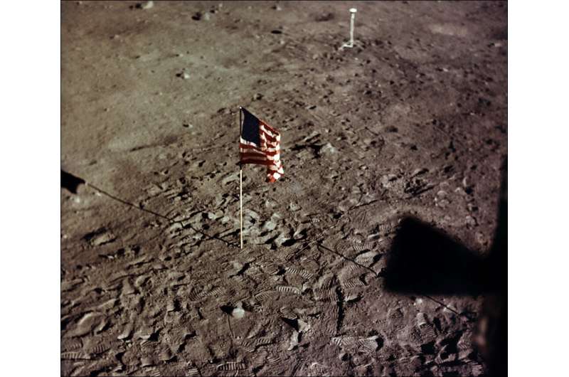 A NASA photo taken on July 20, 1969 shows the US flag and the footprints of astronauts Neil A. Armstrong and Edwin E. Aldrin on 