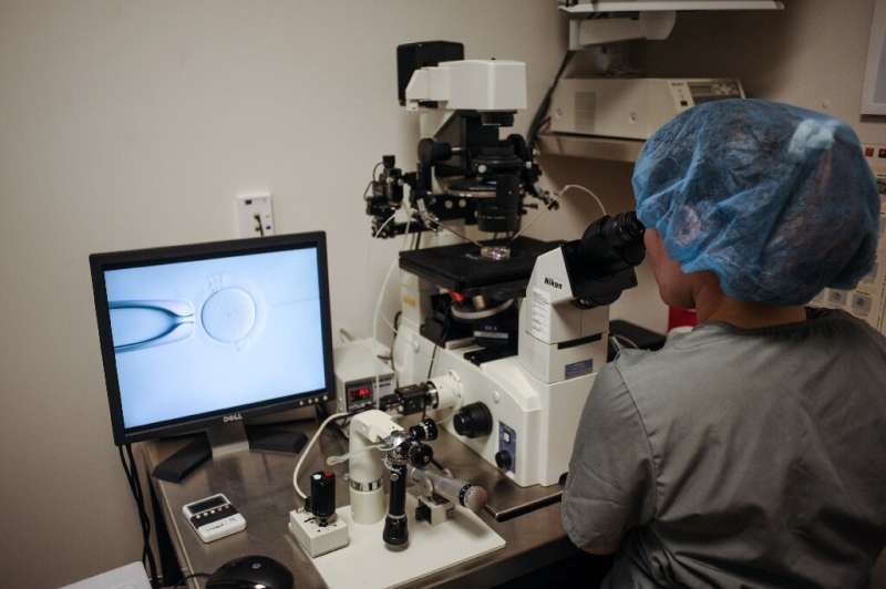 An in-vitro fertilization procedure takes place at the Virginia Center for Reproductive Medicine Clinic in Reston, Virginia
