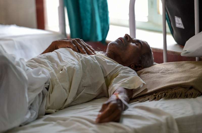 A patient stricken by heat exhaustion recovers in a hospital in Churu, Rajasthan where temperatures have hit 50 degrees Celsius 