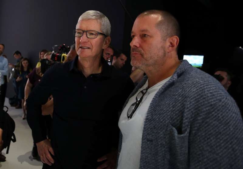 Apple chief design officer Jony Ive (R), seen with CEO Tim Cook at the 2019 Apple Worldwide Developer Conference, is leaving the