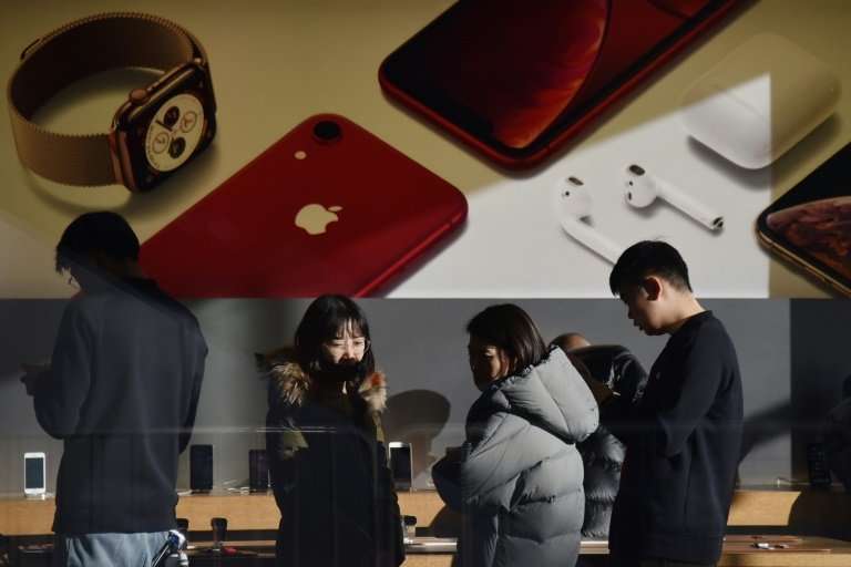 Apple stores in China have continued with business as usual despite a Chinese court-ordered ban on iPhone sales that could hurt 