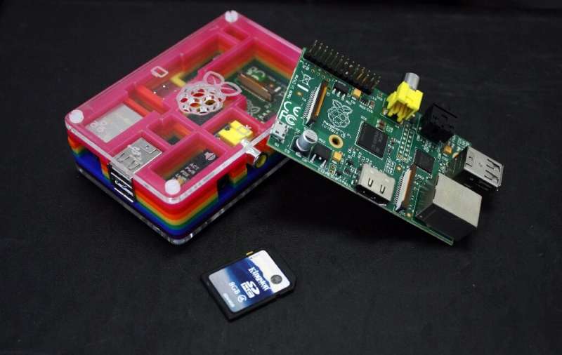 A Raspberry Pi, two of which are pictured, is a credit-card sized device sold for about $30 that plugs into home televisions and