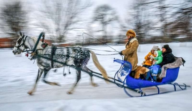 A reindeer-drawn sleigh ride is one way to enjoy Russia in winter