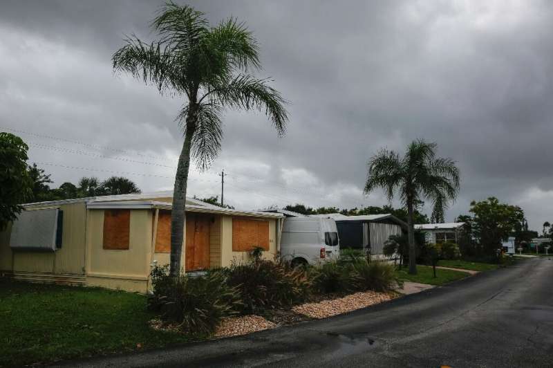 A residence in a mobile home park in Jensen Beach, Florida, was boarded up on September 2, 2019; the area is under a mandatory e