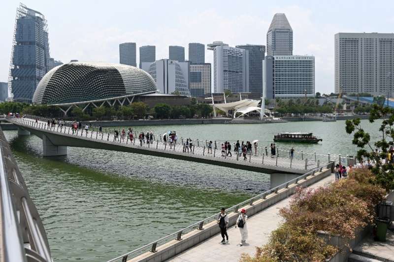As a low-lying island, Singapore is especially vulnerable to the &quot;grave threat&quot; of rising sea levels, Prime Minister L