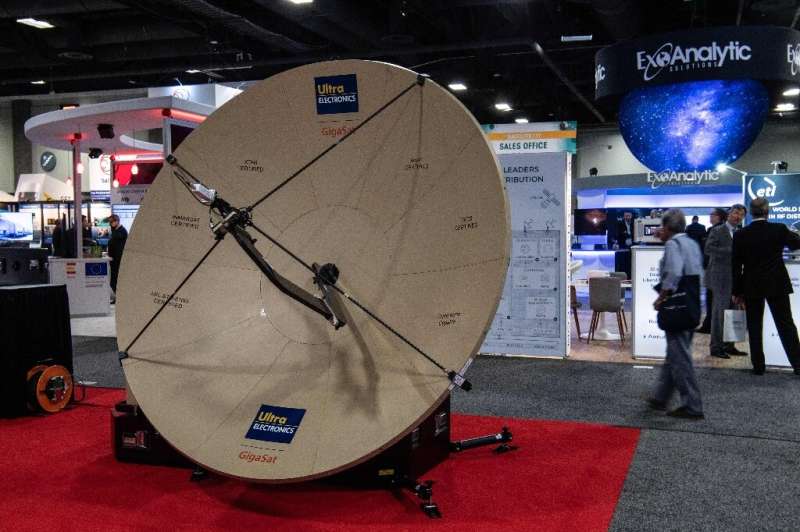 A satellite dish at the Ultra Electronics stand during the Satellite 2019 conference