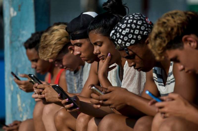 As Cubans like these young people seen recently in Havana enjoy increasing internet connectivity, the government plans to mainta