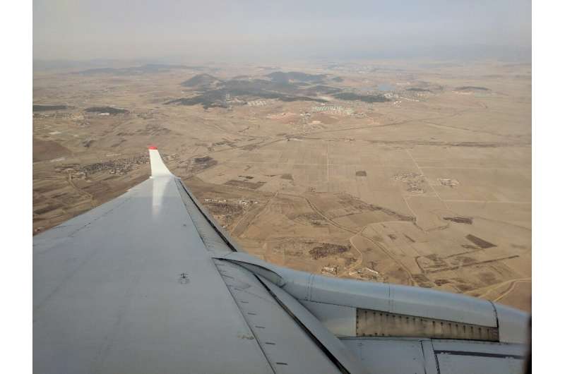 As seen from an airplane, much of North Korea's countryside is dry and parched as the country suffers from what state media says