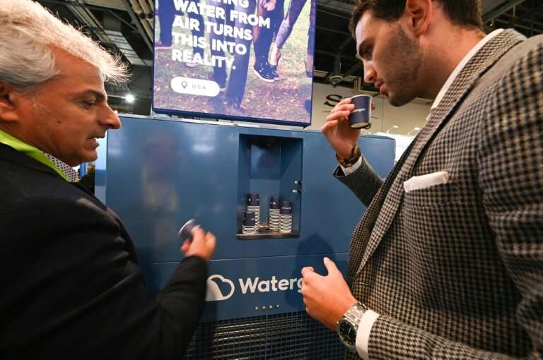 Attendees at CES 2019 in Las Vegas taste water created from the air by the Watergen GEN-350 device