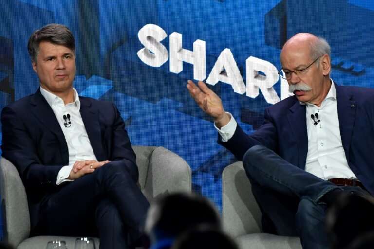 BMW CEO Harald Krueger and Daimler chief Dieter Zetsche announced the plan to combine their companies' carsharing schemes on Fri