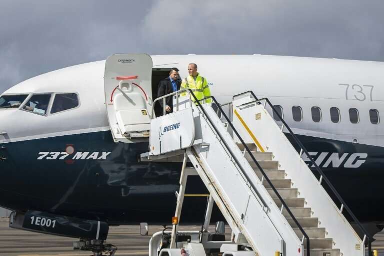Boeing Chief Executive Dennis Muilenburg deplaning a Boeing 737 MAX after a test flight of the company's proposed fix to its ant