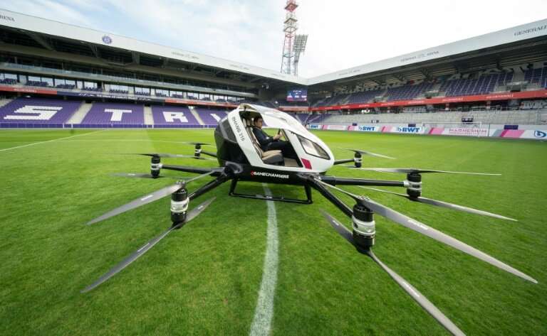 Chinese firm EHang unveiled its aircraft to assembled journalists in the Austrian capital's Generali Arena football stadium