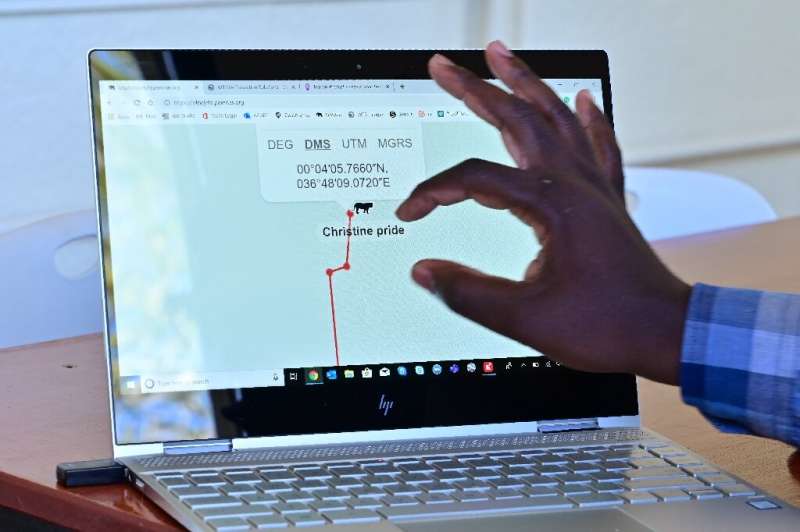 Damian Otieno, an IT engineer, demonstrates on his computer how the technology is applied to animal tracking at what the company