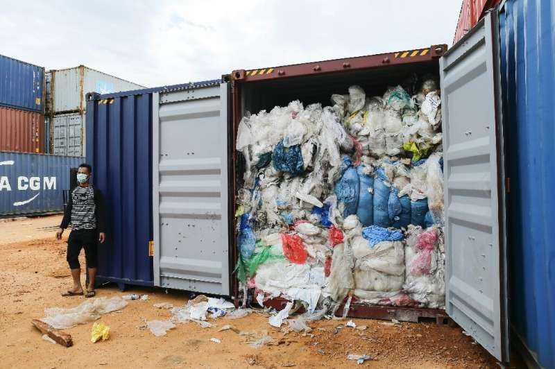 Dozens of shipping containers of waste seized on Batam Island near Singapore have been shipped back to the United States, German