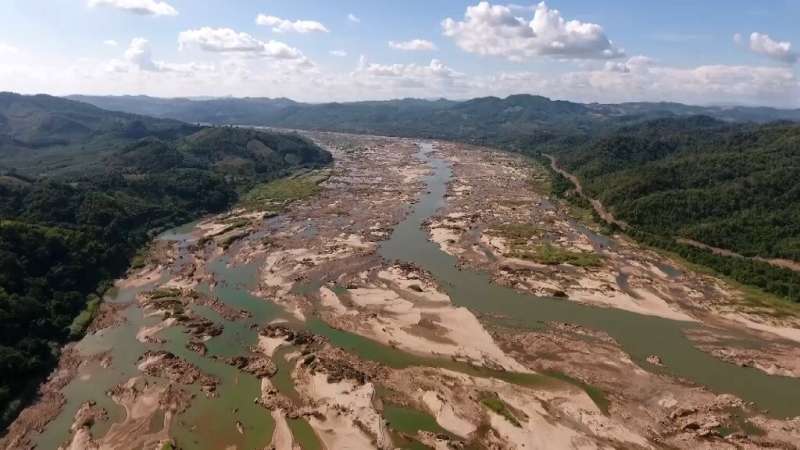 Drone footage of the Mekong in Sungkom district in Thailand's Nong Khai province—show the river reduced to a trickle in places