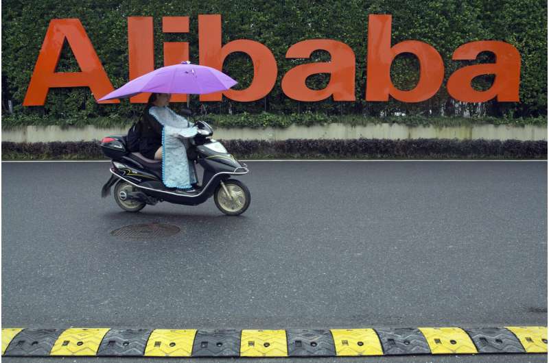 E-commerce giant Alibaba raises $11 billion in share listing