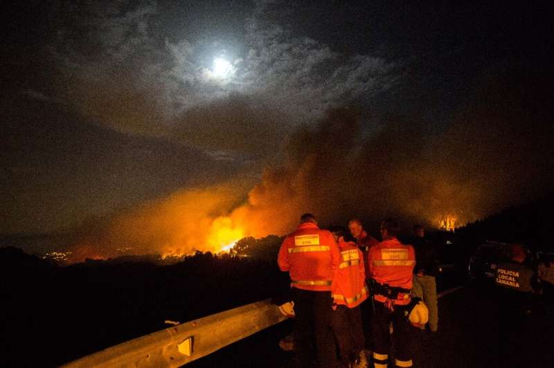 Flames as high as 50 metres complicated the battle against the blaze burning since Saturday