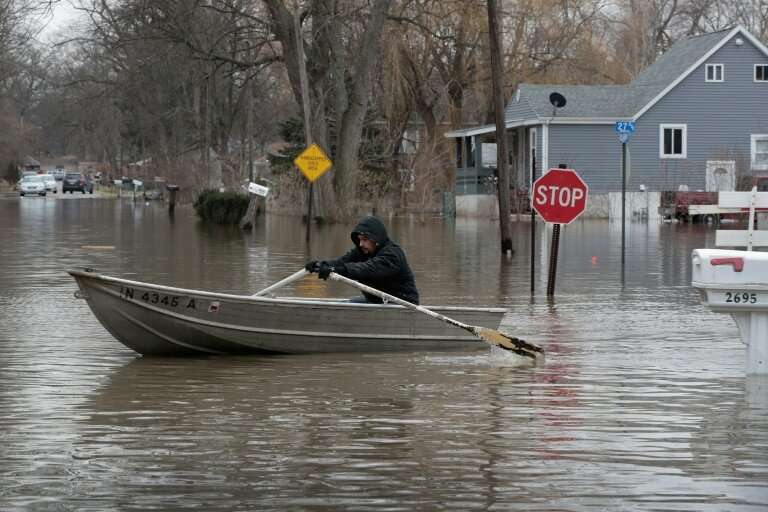 Flooding across the Midwest came a year after heavy rain deluged Indiana, pictured, Illinois, Michigan, Wisconsin and other Midw