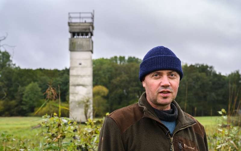 Former border guard Olaf Olejnik patrols the old border are, but this time to survey wildlife