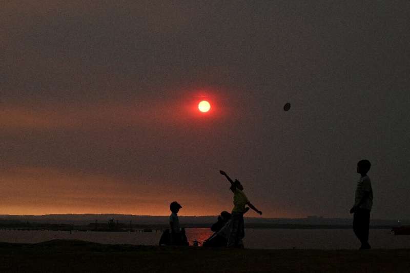 Haze hangs over Sydney as more than 50 bushfires burn across New South Wales state